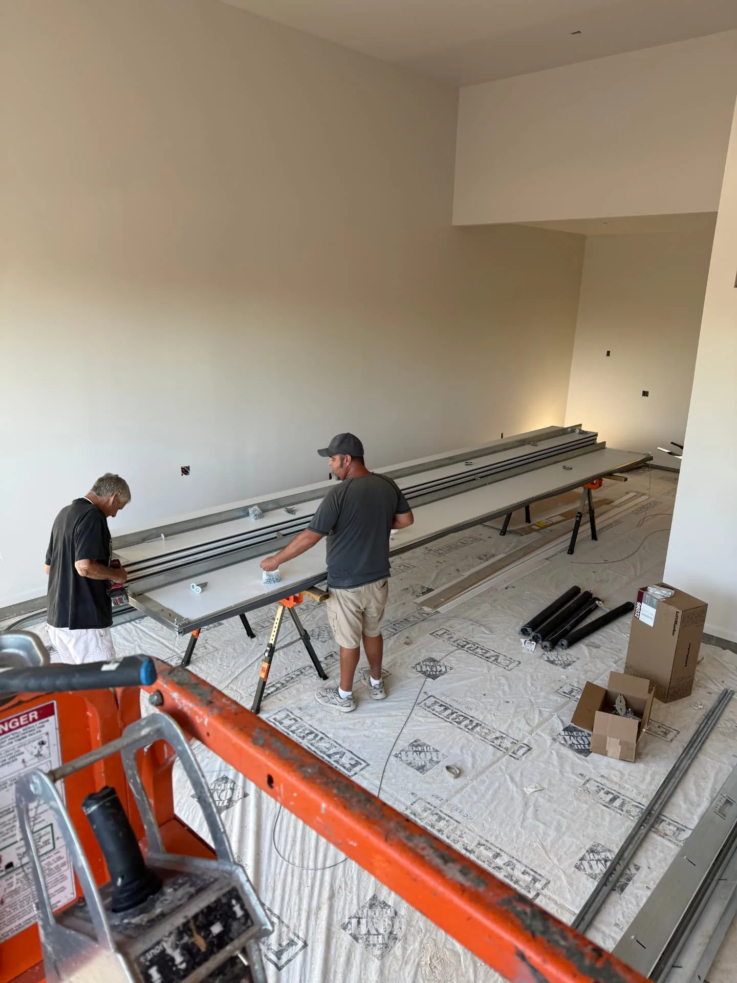 AZ Garage Door Pros installing a new residential garage door in New River, AZ